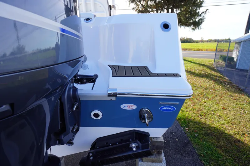 Slide: The Image of 2026 Tidewater 256 CC Adventure boat stern with Seakeeper stabilizer and ABYC certification. - 75