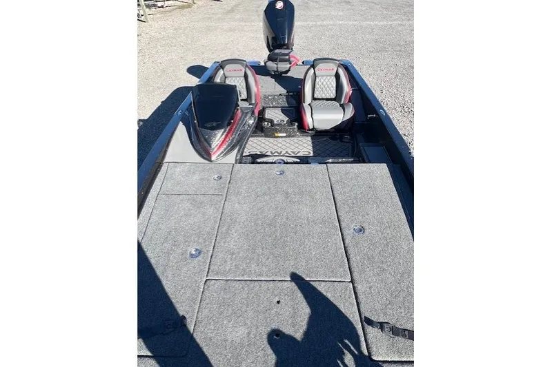 Slide: The Image of 2026 Caymas CX 20 PRO boat interior with dual seats and carpeted deck. - 3