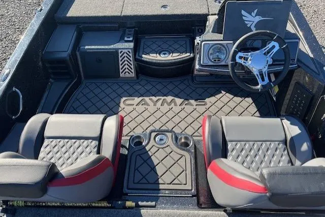Slide: The Image of 2026 Caymas CX 20 PRO boat interior with dual seats and steering wheel. - 6