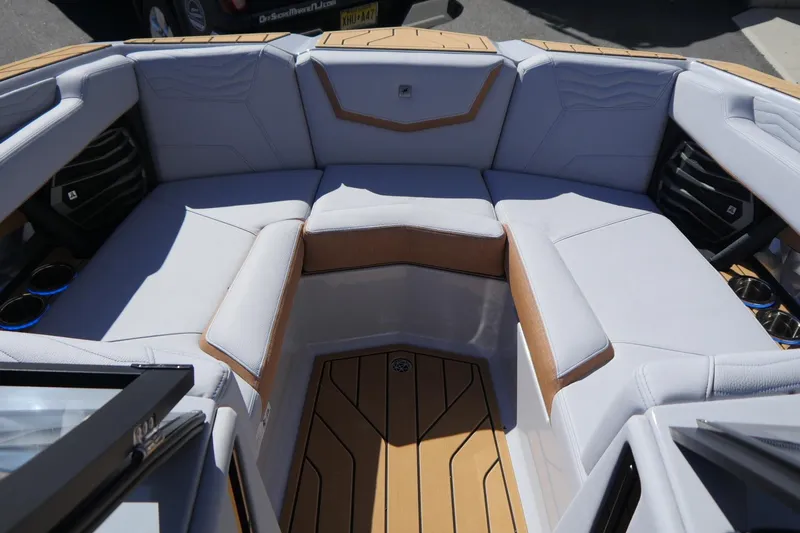 Slide: The Image of 2026 Nautique Super Air Nautique G23 boat interior with luxurious seating and modern design. - 28