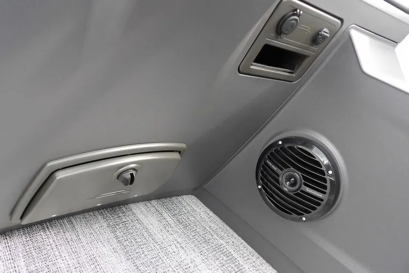Slide: The Image of 2026 Bennington S Swingback 22 SSB interior with speaker and control panel. - 26