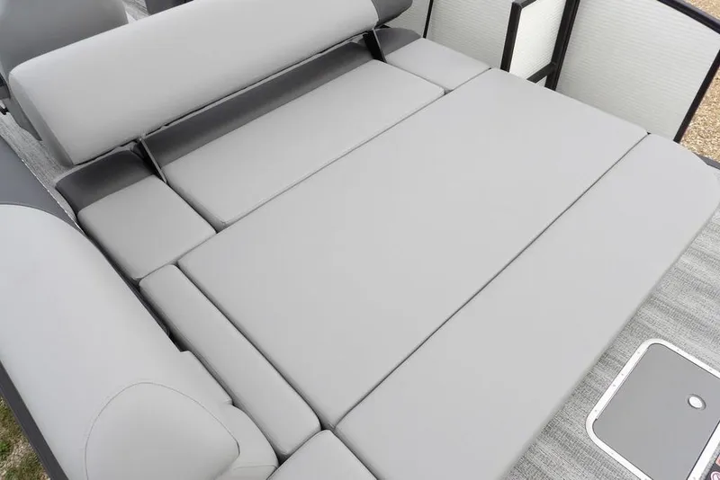 Slide: The Image of 2026 Bennington S Swingback 22 SSB boat with spacious gray seating area. - 28