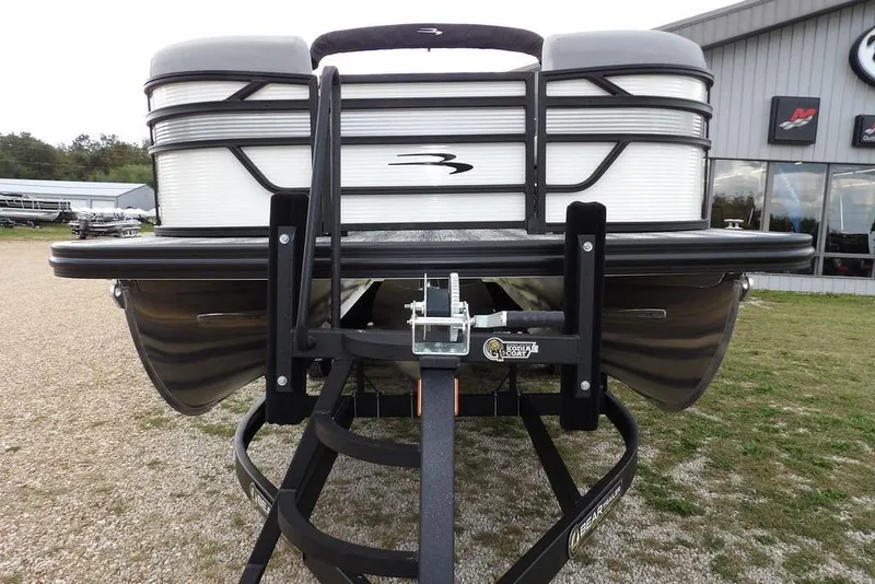 Slide: The Image of 2026 Bennington S Swingback 22 SSB pontoon boat on trailer, front view. - 3