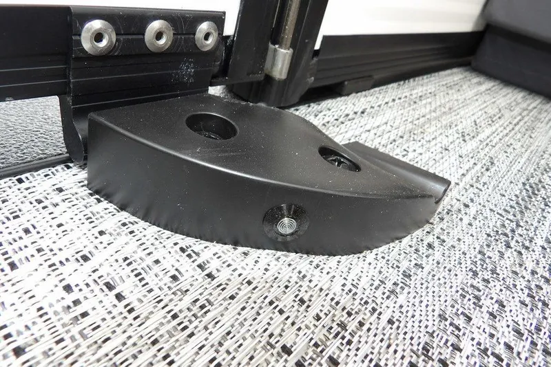 Slide: The Image of Close-up of a 2026 Bennington S Swingback 22 SSB boat component on textured flooring. - 30