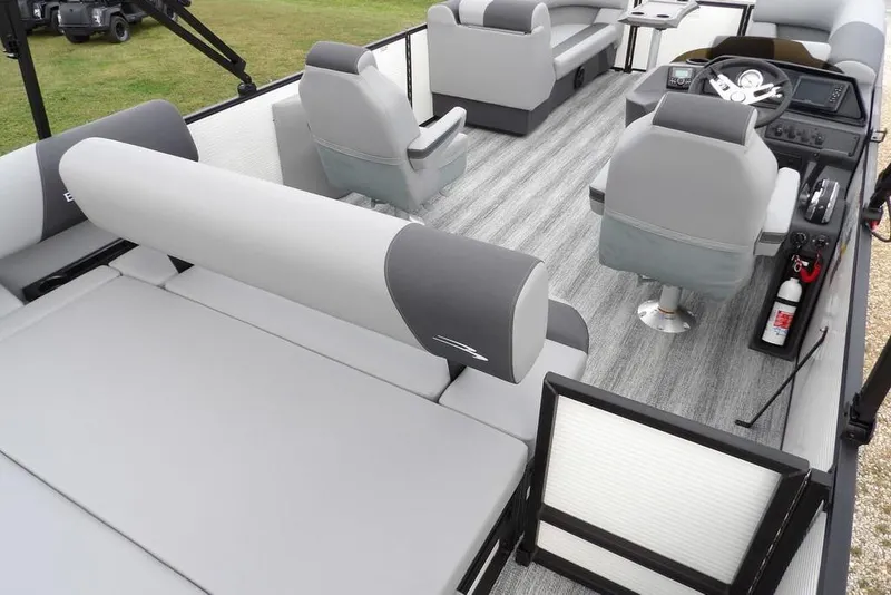 Slide: The Image of 2026 Bennington S Swingback 22 SSB pontoon boat interior with gray seating and modern helm. - 34