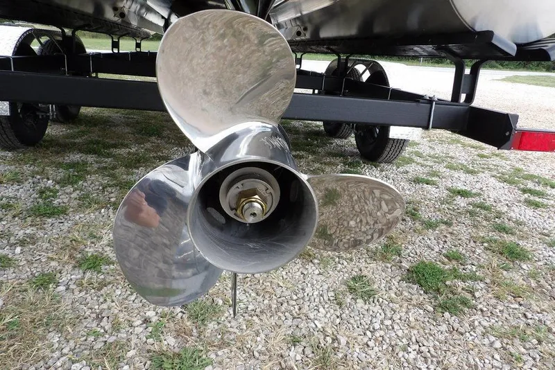 Slide: The Image of Propeller of 2026 Bennington S Swingback 22 SSB on a trailer, displayed outdoors. - 40