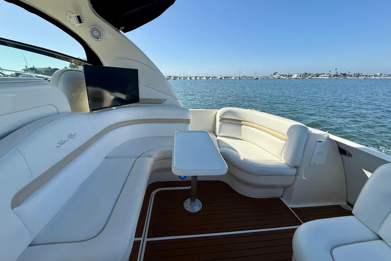 Slide: The Image of Luxurious 2008 Sea Ray 38 Sundancer yacht interior with seating and ocean view. - 17
