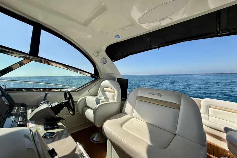 Slide: The Image of Interior view of 2008 Sea Ray 38 Sundancer yacht with ocean backdrop. - 19