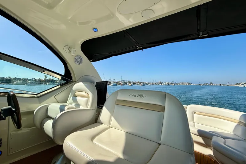 Slide: The Image of Interior view of 2008 Sea Ray 38 Sundancer yacht with ocean backdrop. - 32
