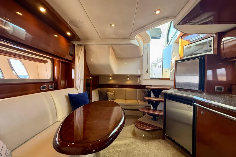 Slide: The Image of Luxurious interior of 2008 Sea Ray 38 Sundancer yacht with elegant seating and modern amenities. - 48