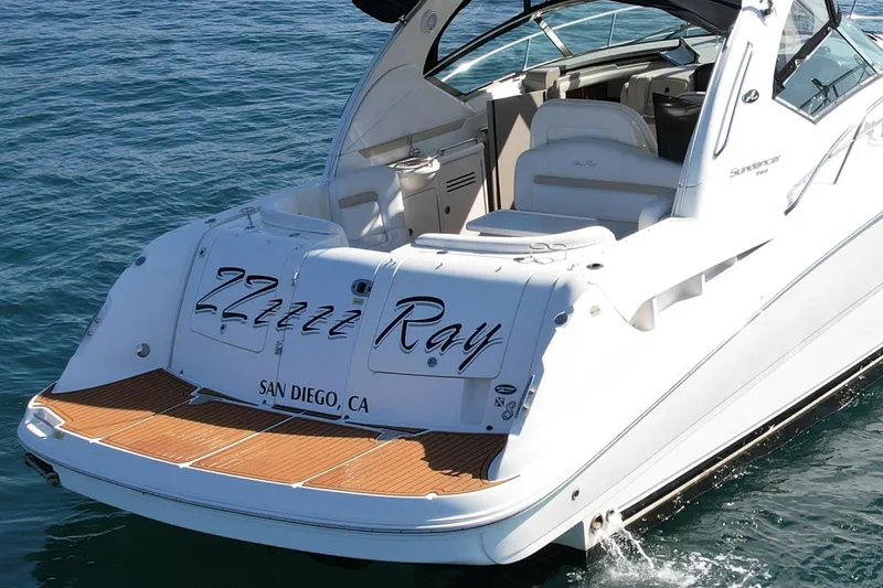 Slide: The Image of 2008 Sea Ray 38 Sundancer yacht on water, San Diego, rear view. - 7