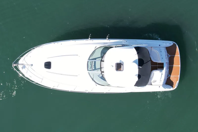 Slide: The Image of Aerial view of 2008 Sea Ray 38 Sundancer yacht on calm water. - 8