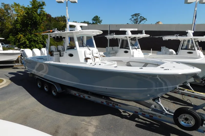 The Image of 2026 Regulator 35 boat on trailer, displayed outdoors in a dealership setting. - 0