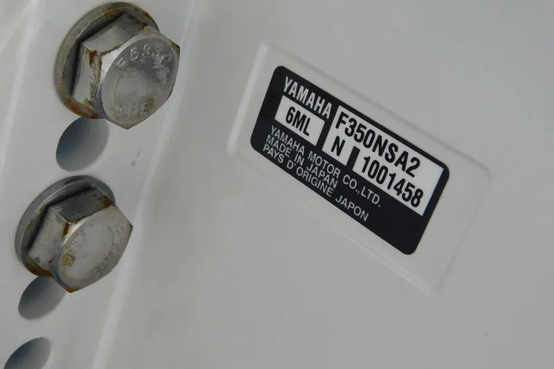Slide: The Image of Label on Yamaha motor, model F350NSA2, with bolts, Regulator 35, 2026. - 101
