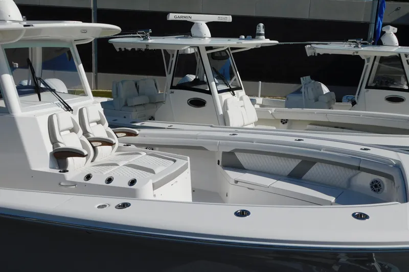 Slide: The Image of 2026 Regulator 35 boat with sleek design and modern seating arrangement. - 106