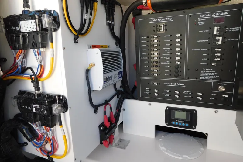 Slide: The Image of Electrical panel of 2026 Regulator 35 boat with wiring and control systems. - 38