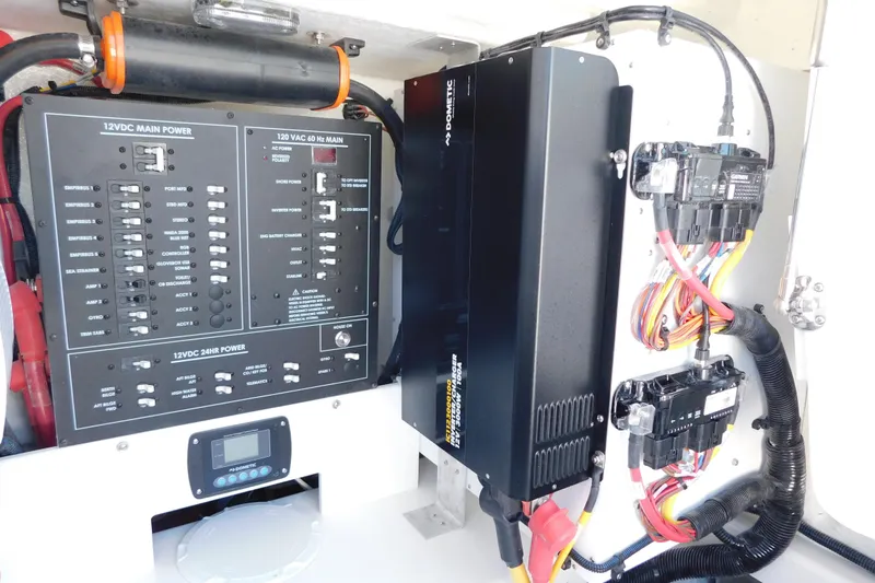 Slide: The Image of Electrical panel and wiring inside a 2026 Regulator 35 boat. - 39