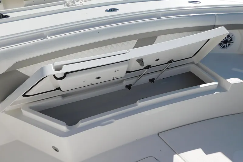 Slide: The Image of Open storage compartment on 2026 Regulator 35 boat, showcasing interior space. - 44