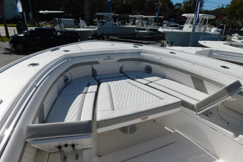 Slide: The Image of 2026 Regulator 35 boat with luxurious white seating and modern design. - 53