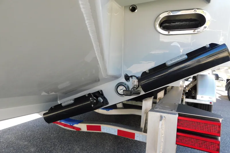 Slide: The Image of 2026 Regulator 35 boat trailer with trim tabs and reflective markers. - 89