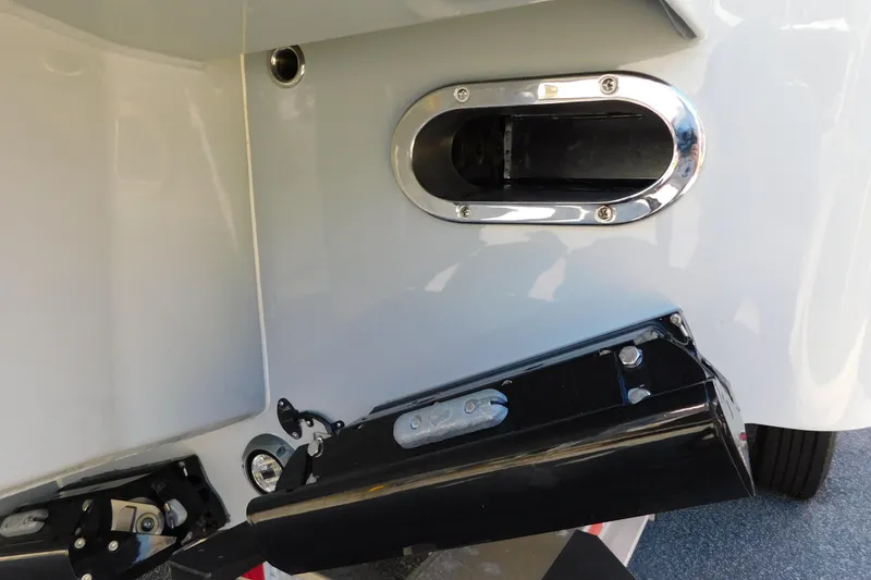 Slide: The Image of Close-up of 2026 Regulator 35 boat's transom with trim tab and exhaust port. - 91