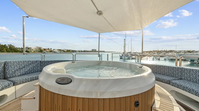 Slide: The Image of Luxurious 2005 New Zealand Yachts Wave Piercer with hot tub and scenic marina view. - 10