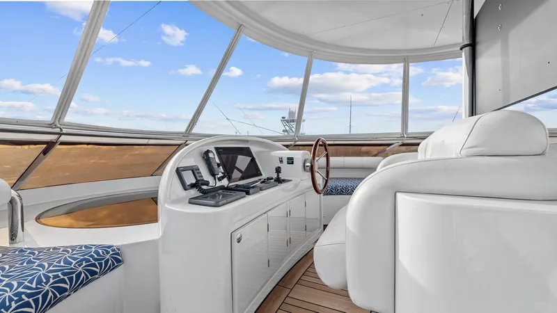 Slide: The Image of Luxurious 2005 New Zealand Yachts Wave Piercer interior with modern navigation equipment and plush seating. - 16