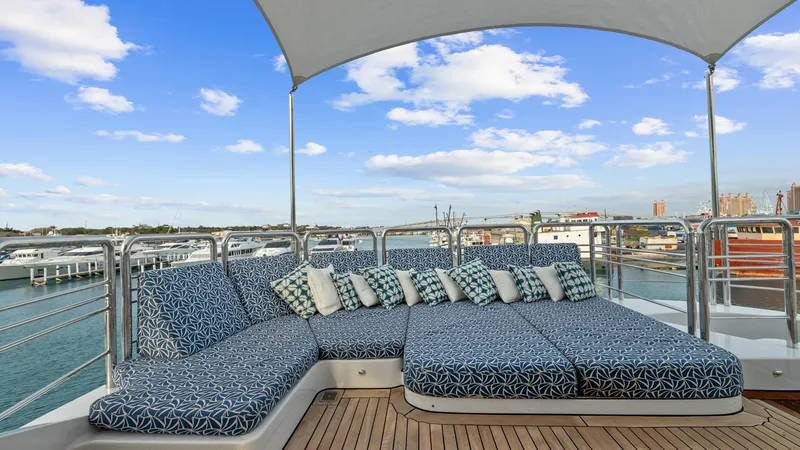 Slide: The Image of Luxurious 2005 New Zealand Yachts Wave Piercer deck with stylish seating and ocean view. - 12