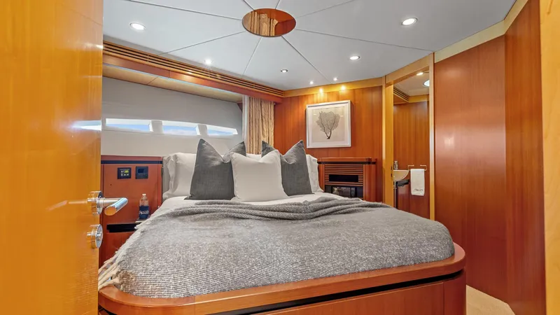 Slide: The Image of Luxurious bedroom interior of 2005 New Zealand Yachts Wave Piercer, featuring elegant wood finishes. - 41