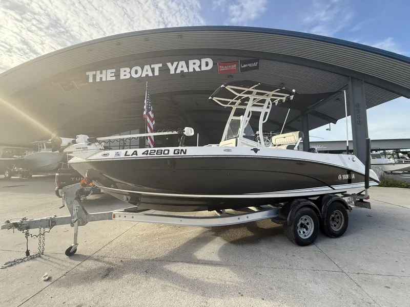 The Image of 2022 Yamaha 210 FSH Sport boat on trailer at The Boat Yard, under 100 hours. - 0