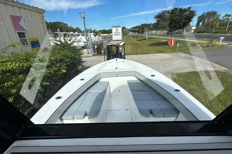 Slide: The Image of 2026 Delta Boatworks Delta D245 at marina, view from cabin, clear sky. - 13