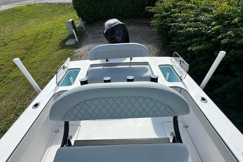 Slide: The Image of 2026 Delta Boatworks Delta D245 interior with seating and storage compartments. - 14