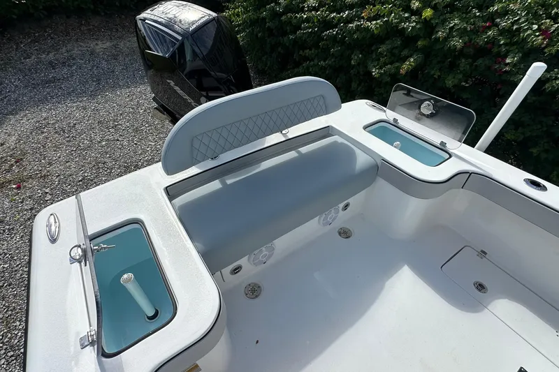 Slide: The Image of 2026 Delta Boatworks Delta D245 interior with seating and storage compartments. - 15