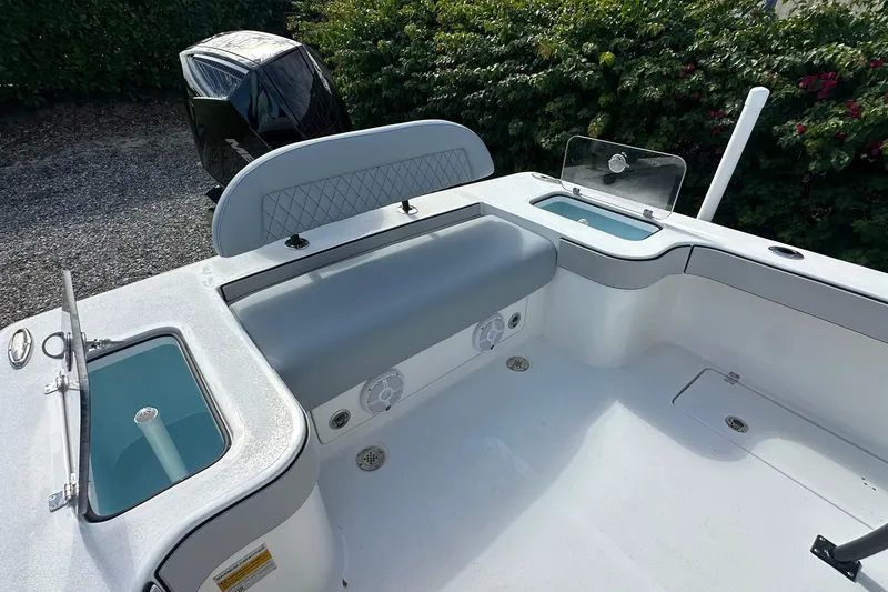 Slide: The Image of 2026 Delta Boatworks Delta D245 interior with seating and storage compartments. - 17