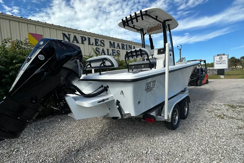 Slide: The Image of 2026 Delta Boatworks Delta D245 on trailer at Naples Marina Sales. - 2