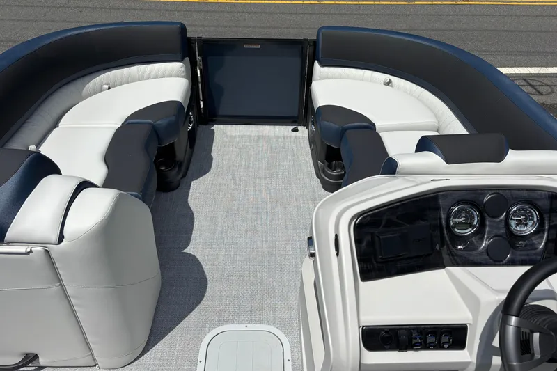 Slide: The Image of 2026 Avalon LSZ ELITE boat interior with luxurious seating and modern dashboard. - 4