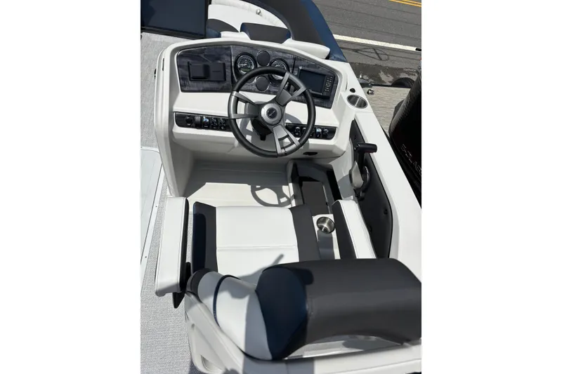 Slide: The Image of 2026 Avalon LSZ ELITE boat cockpit with modern steering and controls. - 5