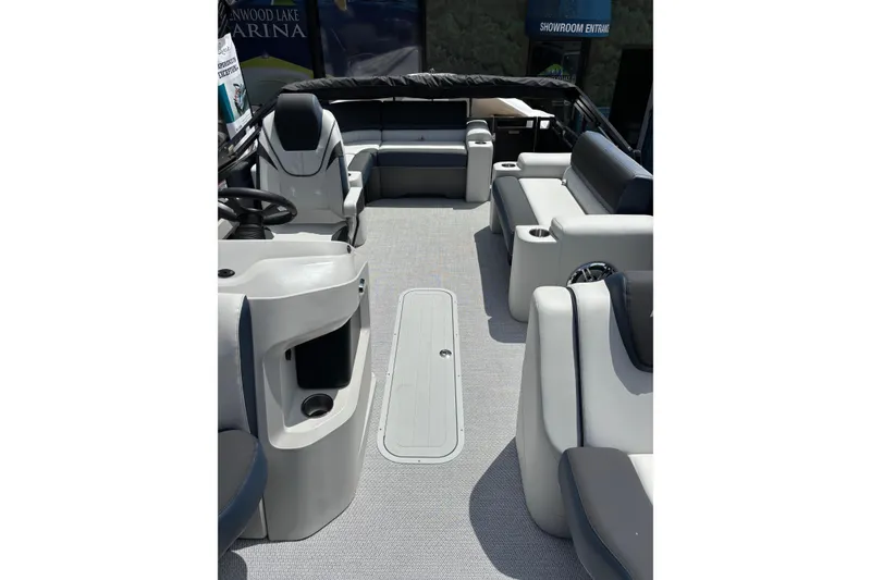 Slide: The Image of 2026 Avalon LSZ ELITE pontoon boat interior with luxurious seating and modern design. - 7
