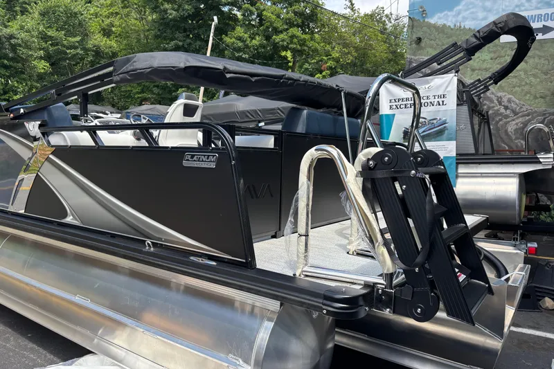 Slide: The Image of 2026 Avalon LSZ ELITE pontoon boat with sleek design and modern features. - 9