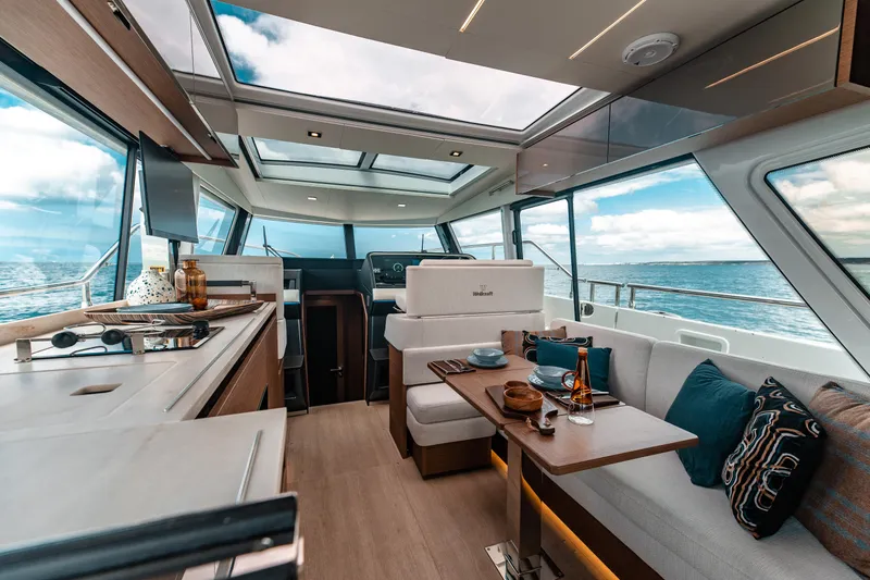 Slide: The Image of Luxurious interior of 2026 Wellcraft 44 Explorer yacht with ocean view and modern amenities. - 12