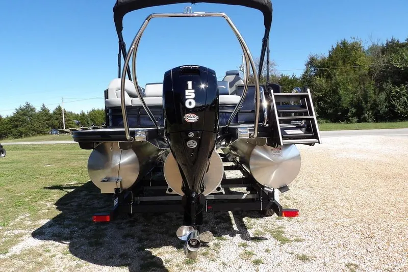 Slide: The Image of 2026 Bennington S Swingback 22 SSB pontoon boat with 150 horsepower engine, rear view. - 10