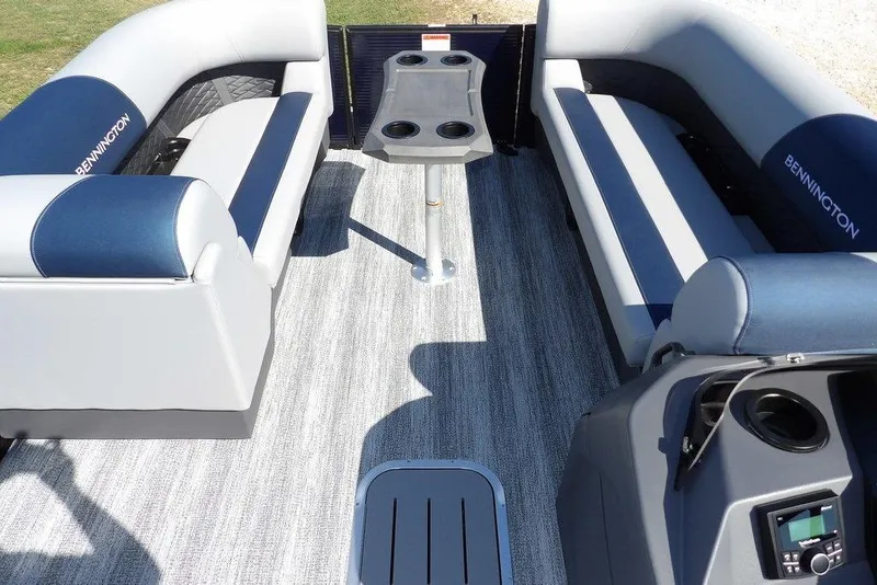 Slide: The Image of 2026 Bennington S Swingback 22 SSB interior with seating and table, featuring modern design. - 14