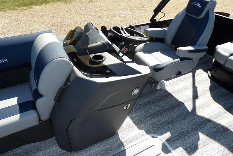 Slide: The Image of 2026 Bennington S Swingback 22 SSB boat interior with modern seating and helm. - 15