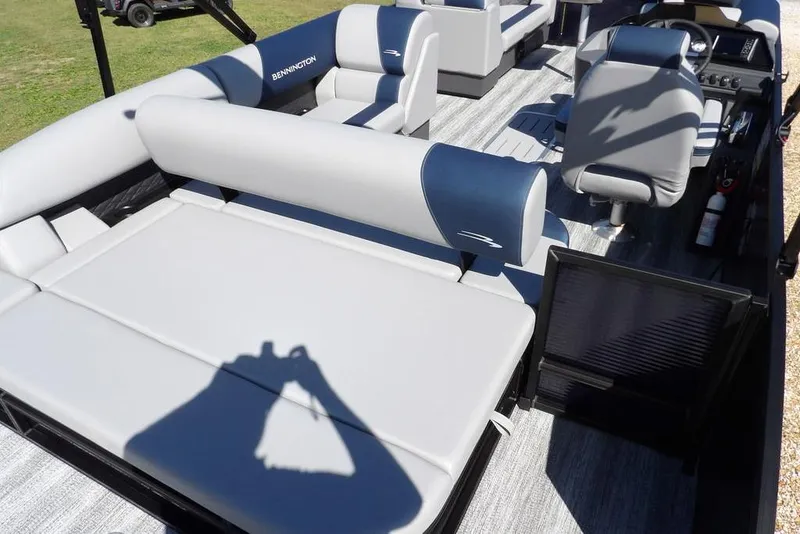 Slide: The Image of 2026 Bennington S Swingback 22 SSB pontoon boat interior with plush seating and modern design. - 29