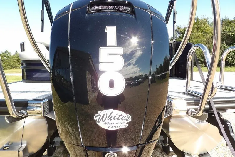 Slide: The Image of Outboard motor on 2026 Bennington S Swingback 22 SSB pontoon boat, sunny day reflection. - 36