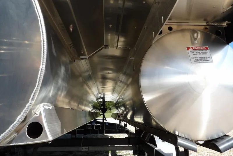 Slide: The Image of Underneath view of 2026 Bennington S Swingback 22 SSB pontoon boat, showcasing metallic structure. - 38