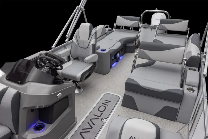 Slide: The Image of Manufacturer Provided Image: 2025 Avalon LSZ Quad Lounger Shift boat interior with modern seating and ambient lighting. - 16