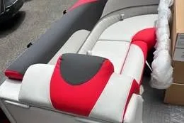 Slide: The Image of 2025 Avalon LSZ Quad Lounger Shift with red and gray seating design. - 4