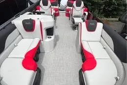 Slide: The Image of 2025 Avalon LSZ Quad Lounger Shift with stylish red and white seating arrangement. - 6