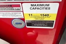 Slide: The Image of 2025 Avalon LSZ Quad Lounger Shift capacity label, max 11 persons or 1540 lbs. - 7